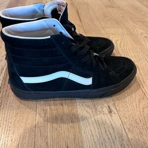 Vans Black and White High-Top Sneakers